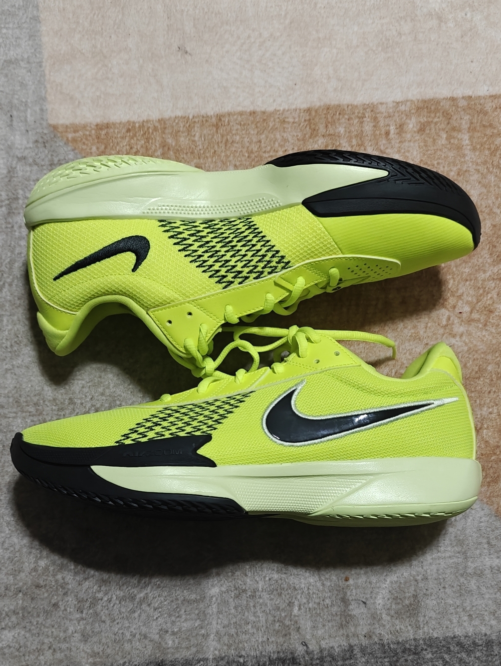 Nike G.T. Cut Academy Basketball Shoes in the vibrant Volt and Anthrac